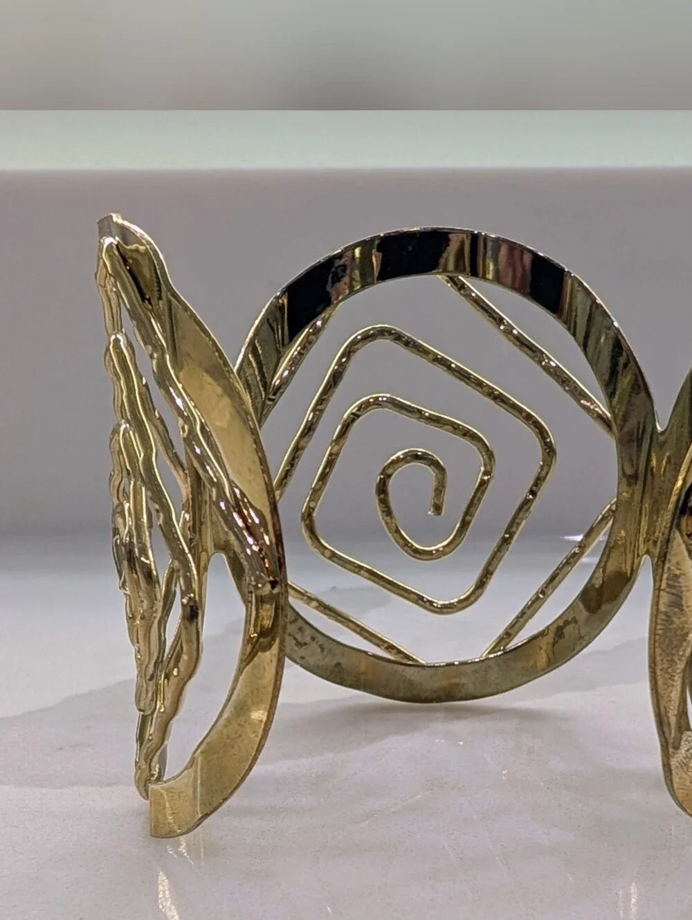 Gold Tone Spiral Cutout Cuff Bracelet - Picture 2 of 5